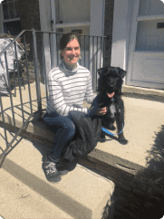 Scott and Taylor sitting on their porch when he was first adopted